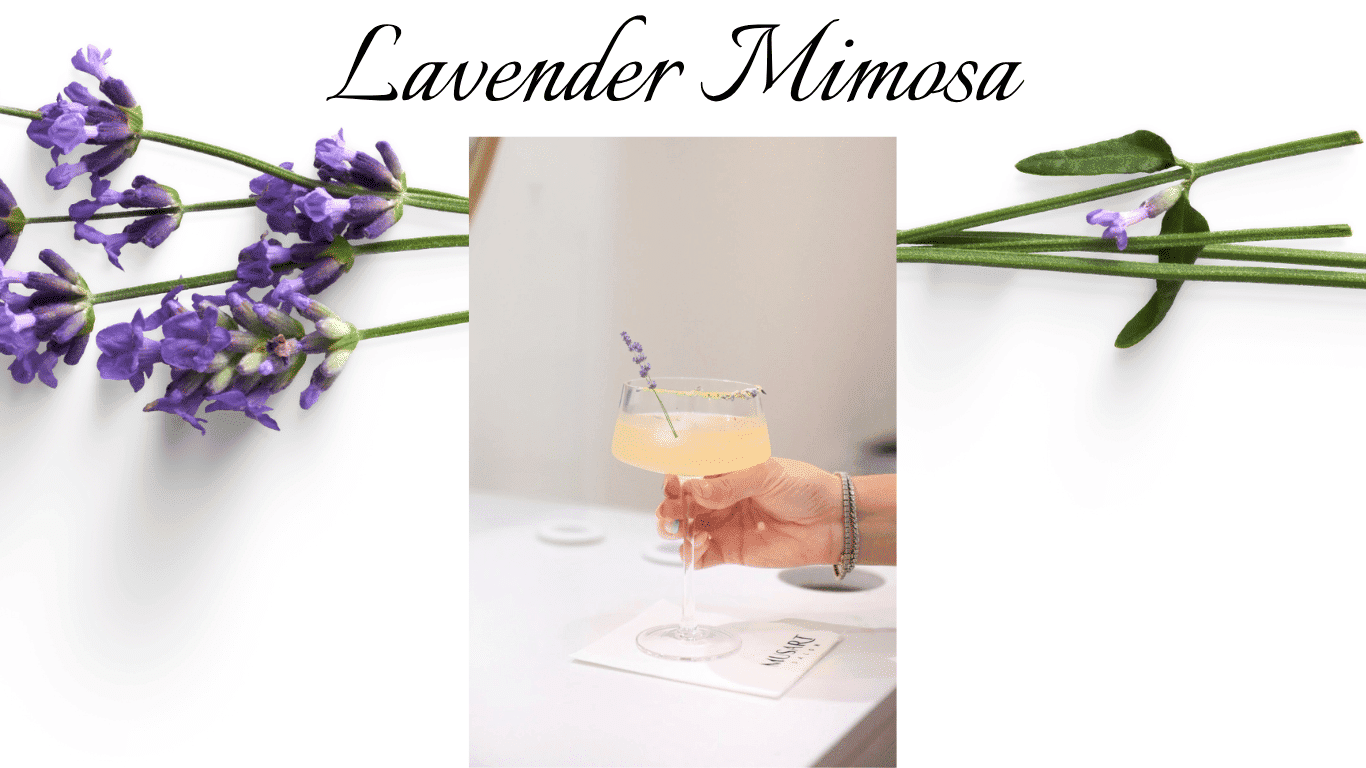 A hand holding a lavender mimosa cocktail, garnished with a sprig and surrounded by flowers.