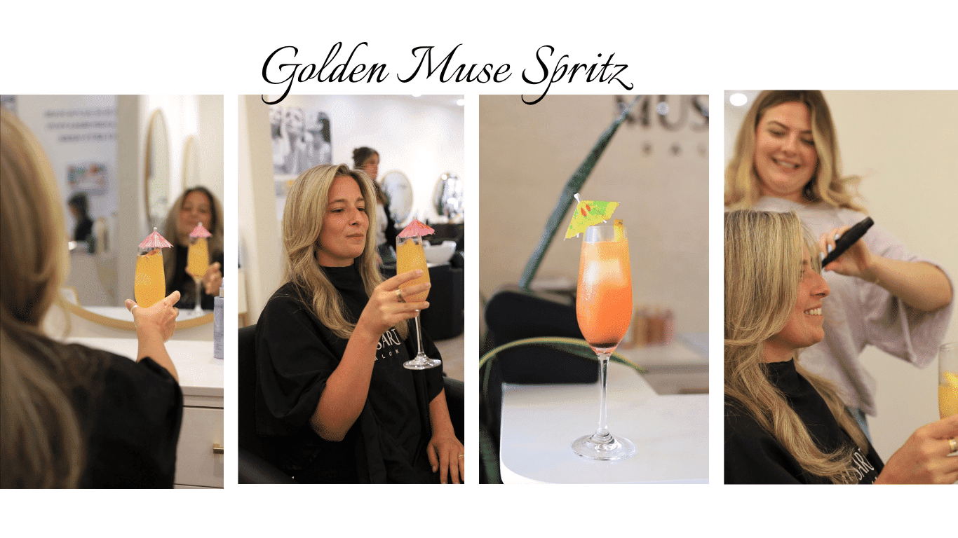 A woman enjoys a cocktail at a salon while getting her hair done.